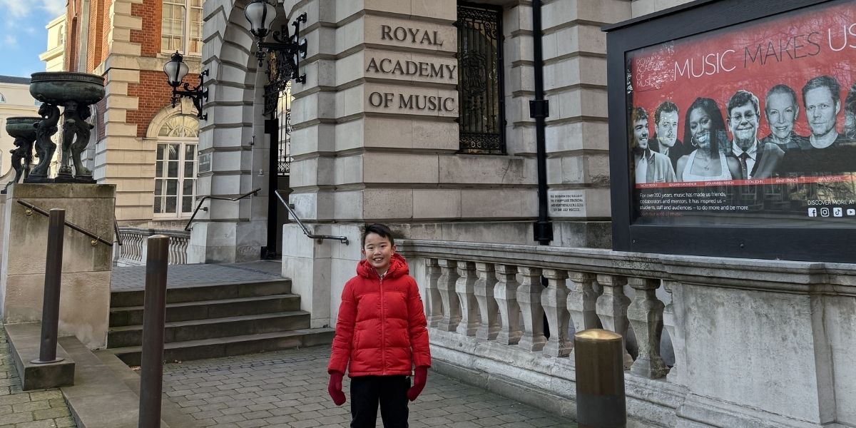 Bowen stood outside the Royal Academy of Music in London