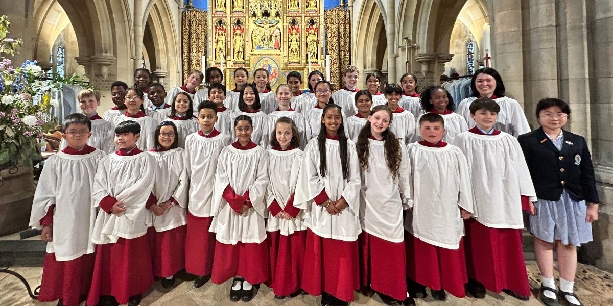 The Chapel Choir smiling to the camera before their performance at Marlborough College